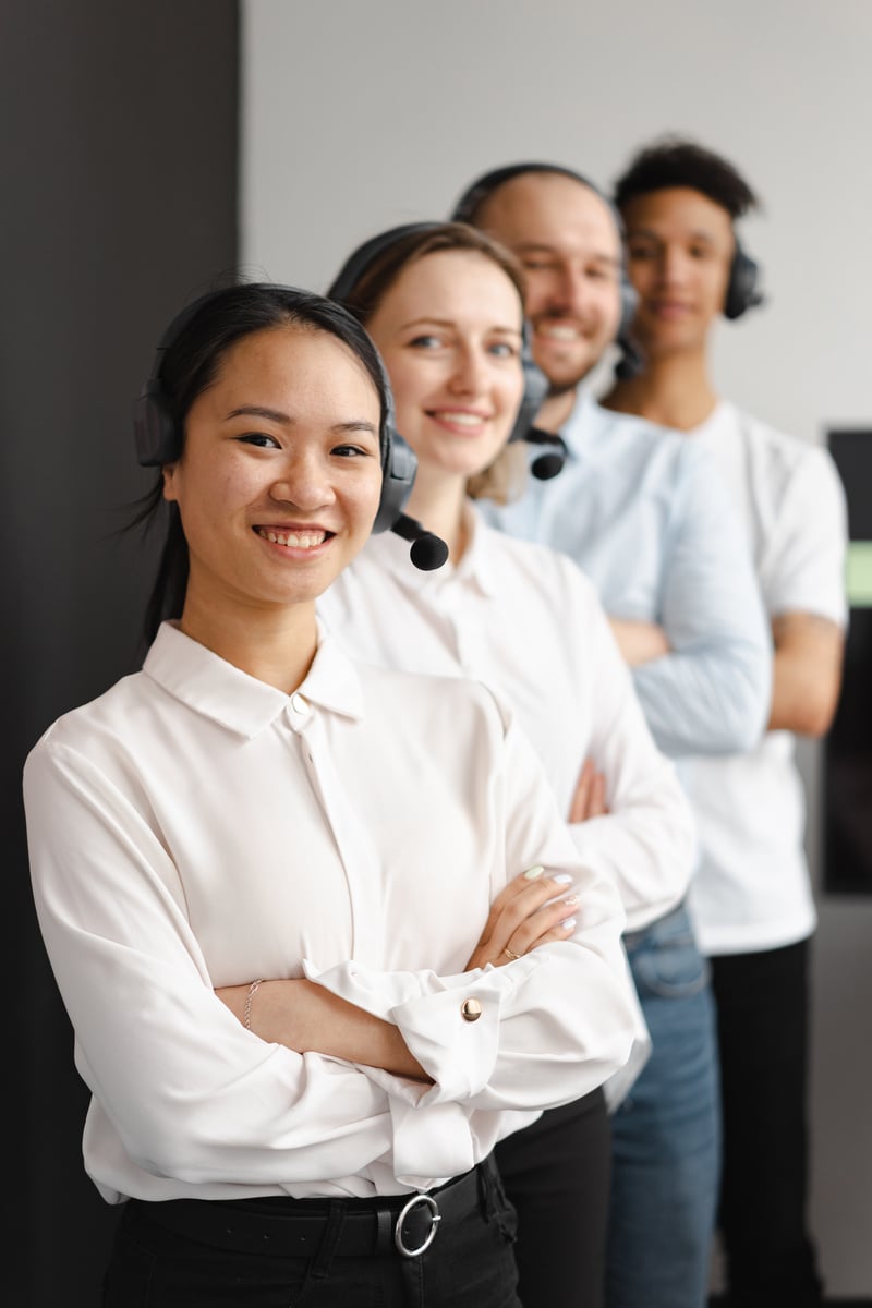 Call Center Agents Smiling while Standing